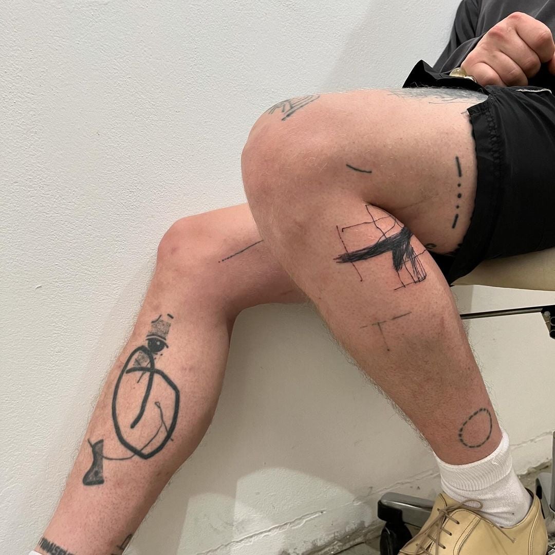Contemporary tattoo design by Andrii Volkov capturing impermanent urban marks translated into permanent body art